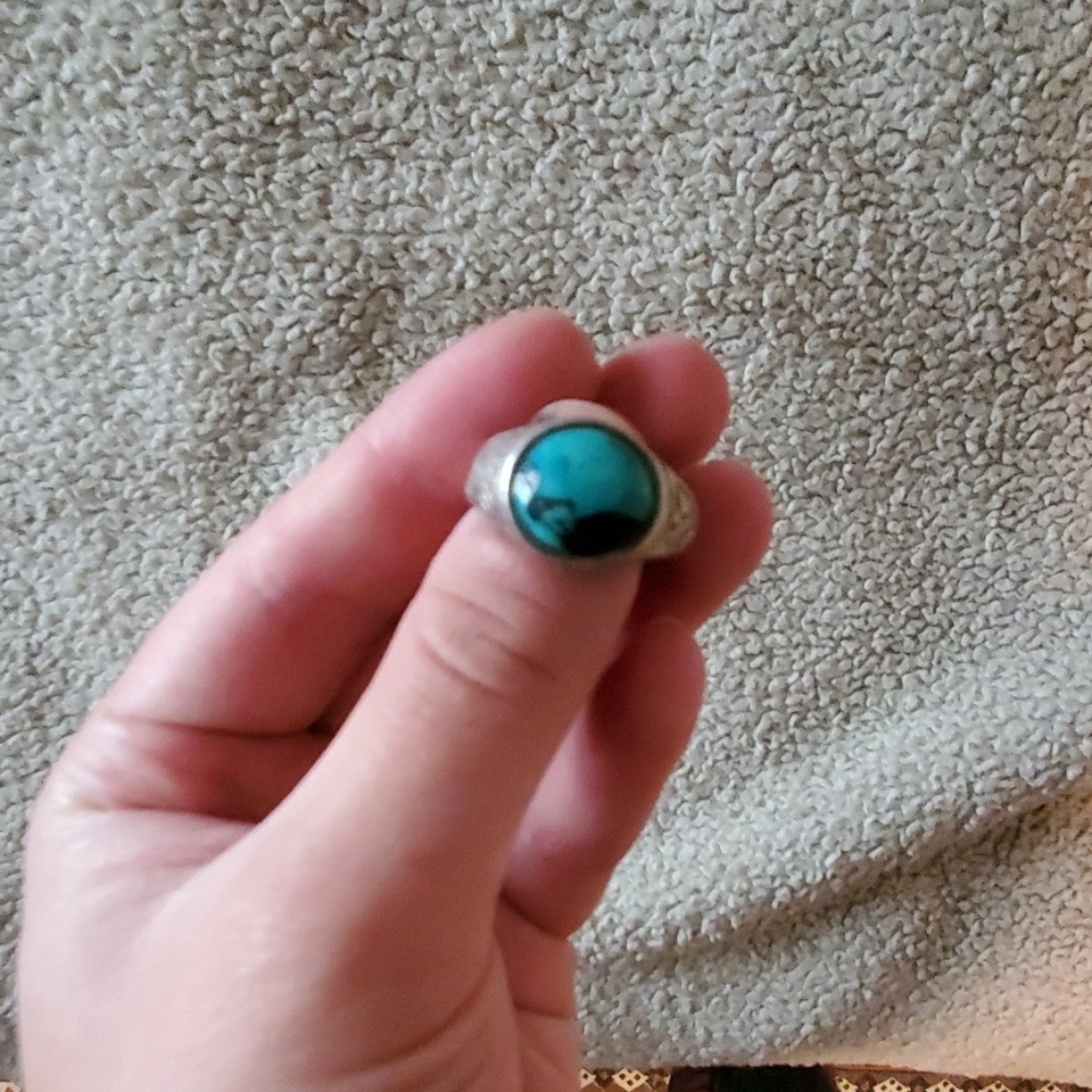 Turquoise ring with floral engraving